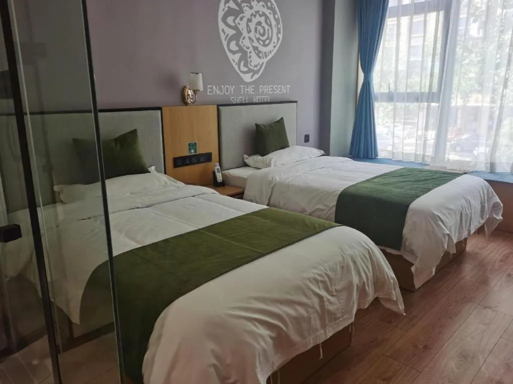 Bed in Shell Hotel Anhui Huaibei Railway Station Huiyuan Road