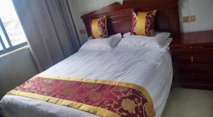 Bed in Shell Hotel Wuxi Jiangyin Zhutang Town