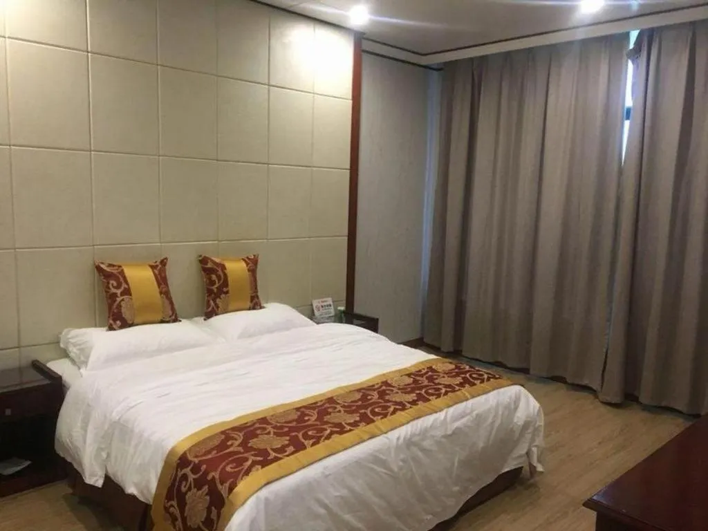 Bed in Shell Hotel Wuxi Jiangyin Zhutang Town