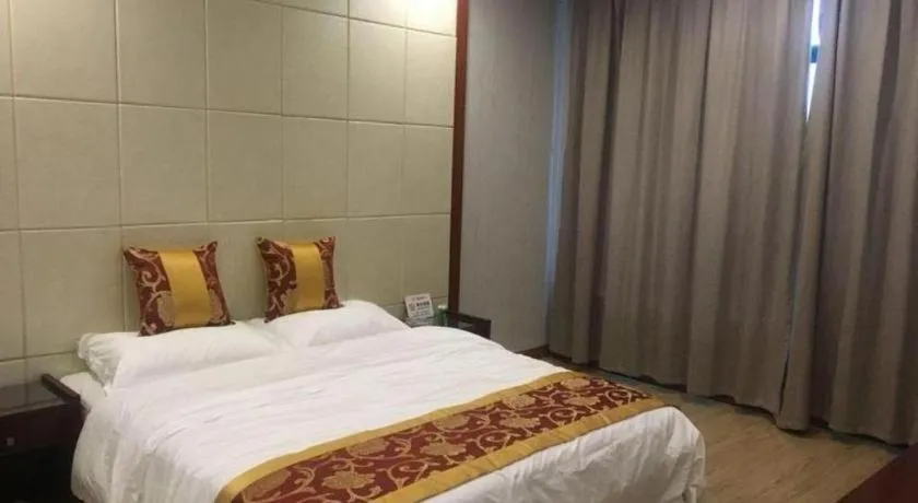 Bed in Shell Hotel Wuxi Jiangyin Zhutang Town