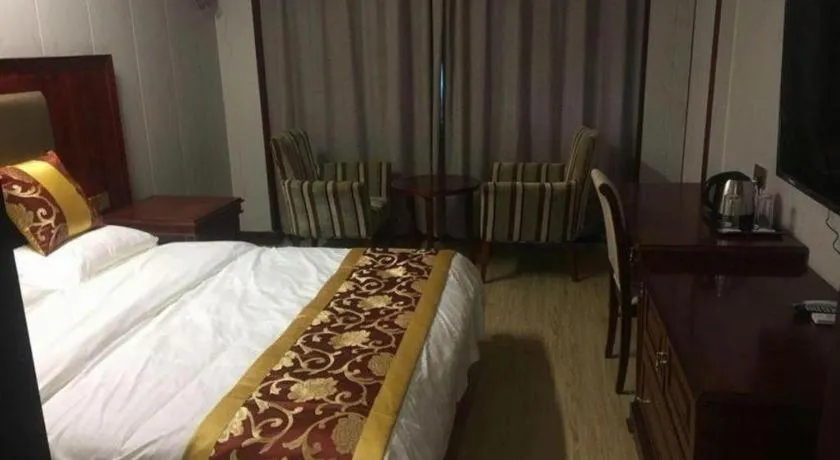 Bed in Shell Hotel Wuxi Jiangyin Zhutang Town