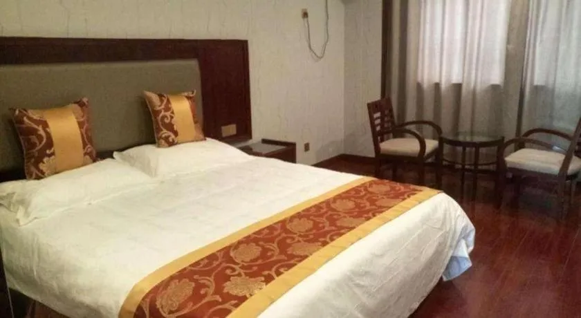 Bed in Shell Hotel Wuxi Jiangyin Zhutang Town