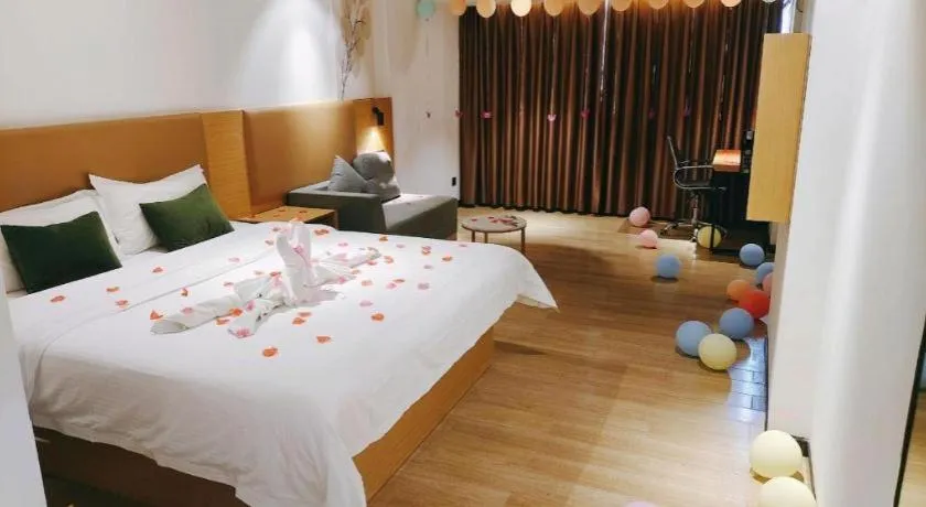 Bed in Green Tree Inn Guangxi Wuzhou 2nd Xinxing Road Liangguang Market