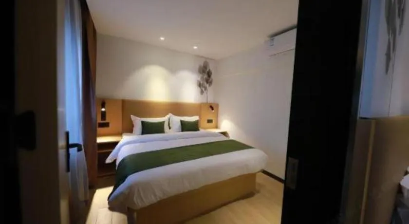 Bed in Green Tree Inn Guangxi Wuzhou 2nd Xinxing Road Liangguang Market