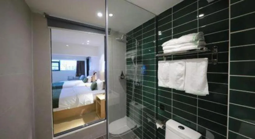 Bed in Green Tree Inn Guangxi Wuzhou 2nd Xinxing Road Liangguang Market