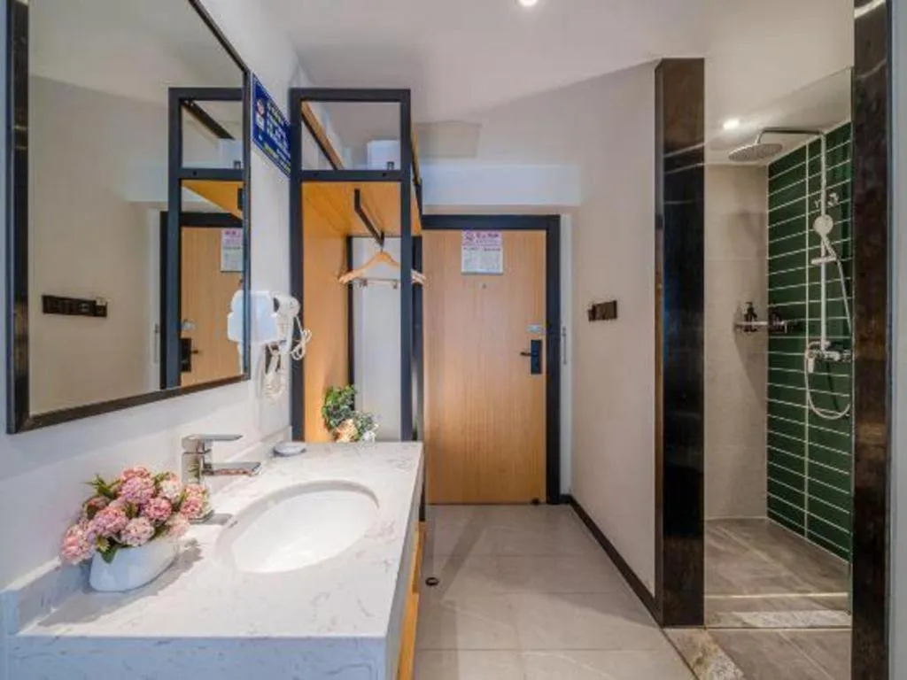 Bed in Green Tree Inn Guangxi Wuzhou 2nd Xinxing Road Liangguang Market