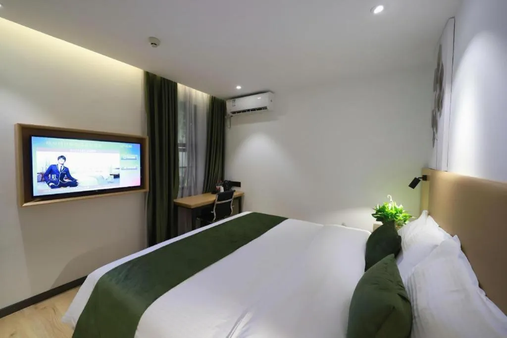 Bed in Green Tree Inn Guangxi Wuzhou 2nd Xinxing Road Liangguang Market