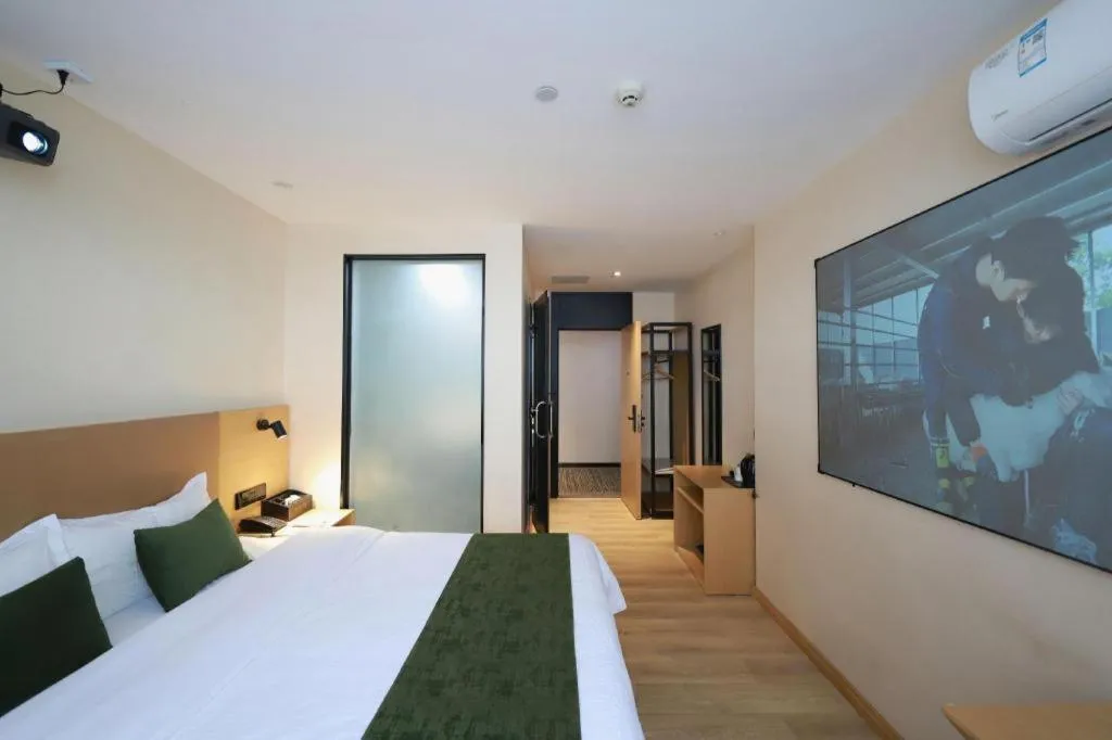 Bed in Green Tree Inn Guangxi Wuzhou 2nd Xinxing Road Liangguang Market