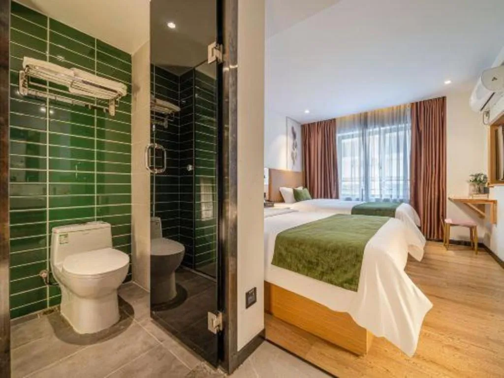 Bed in Green Tree Inn Guangxi Wuzhou 2nd Xinxing Road Liangguang Market