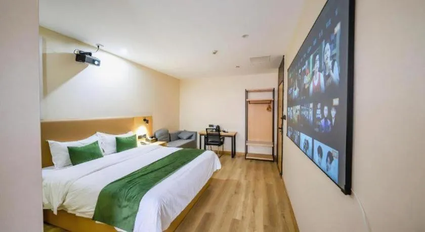 Bed in Green Tree Inn Guangxi Wuzhou 2nd Xinxing Road Liangguang Market