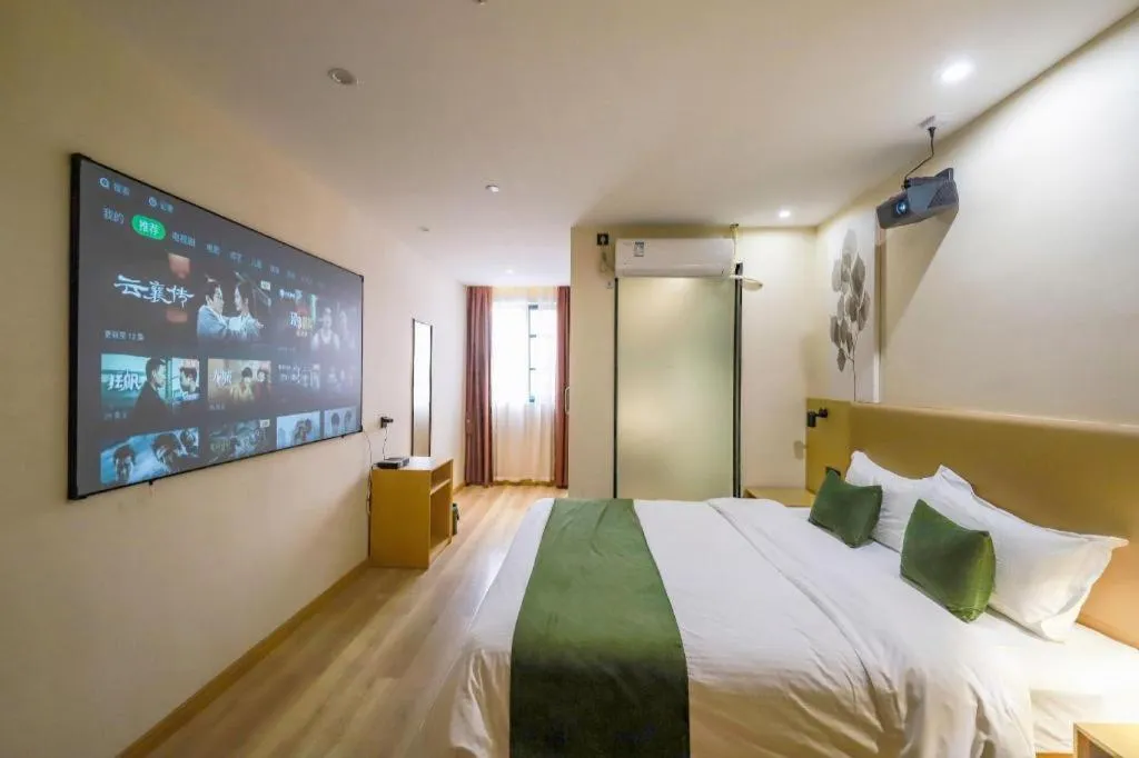 Bed in Green Tree Inn Guangxi Wuzhou 2nd Xinxing Road Liangguang Market