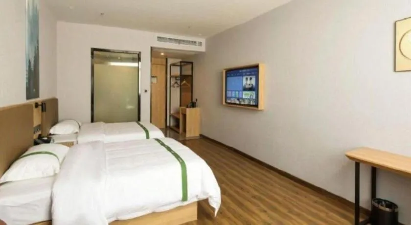 Bed in Green Tree Inn Guangxi Wuzhou 2nd Xinxing Road Liangguang Market