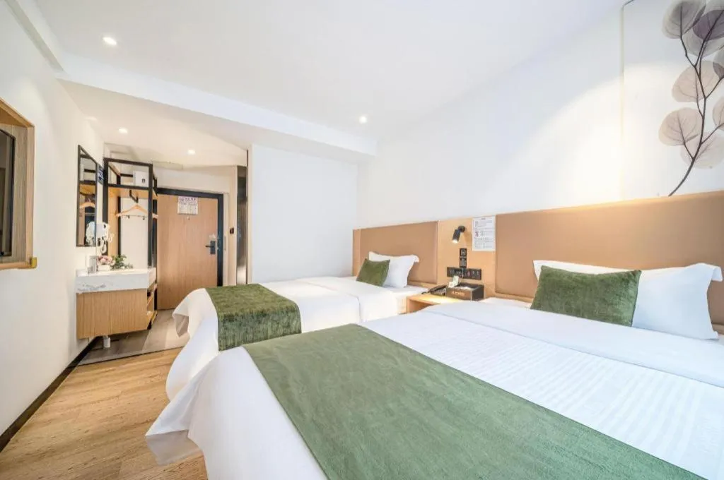 Bed in Green Tree Inn Guangxi Wuzhou 2nd Xinxing Road Liangguang Market