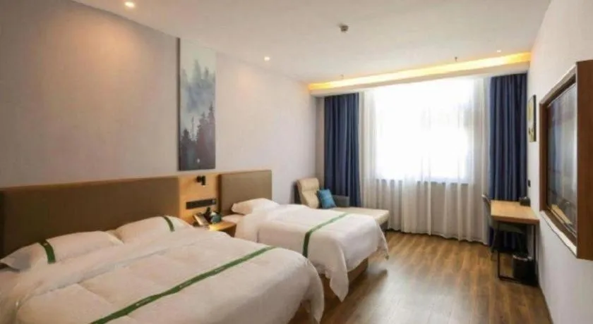 Bed in Green Tree Inn Guangxi Wuzhou 2nd Xinxing Road Liangguang Market
