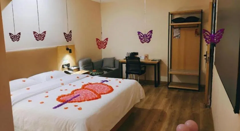 Bed in Green Tree Inn Guangxi Wuzhou 2nd Xinxing Road Liangguang Market