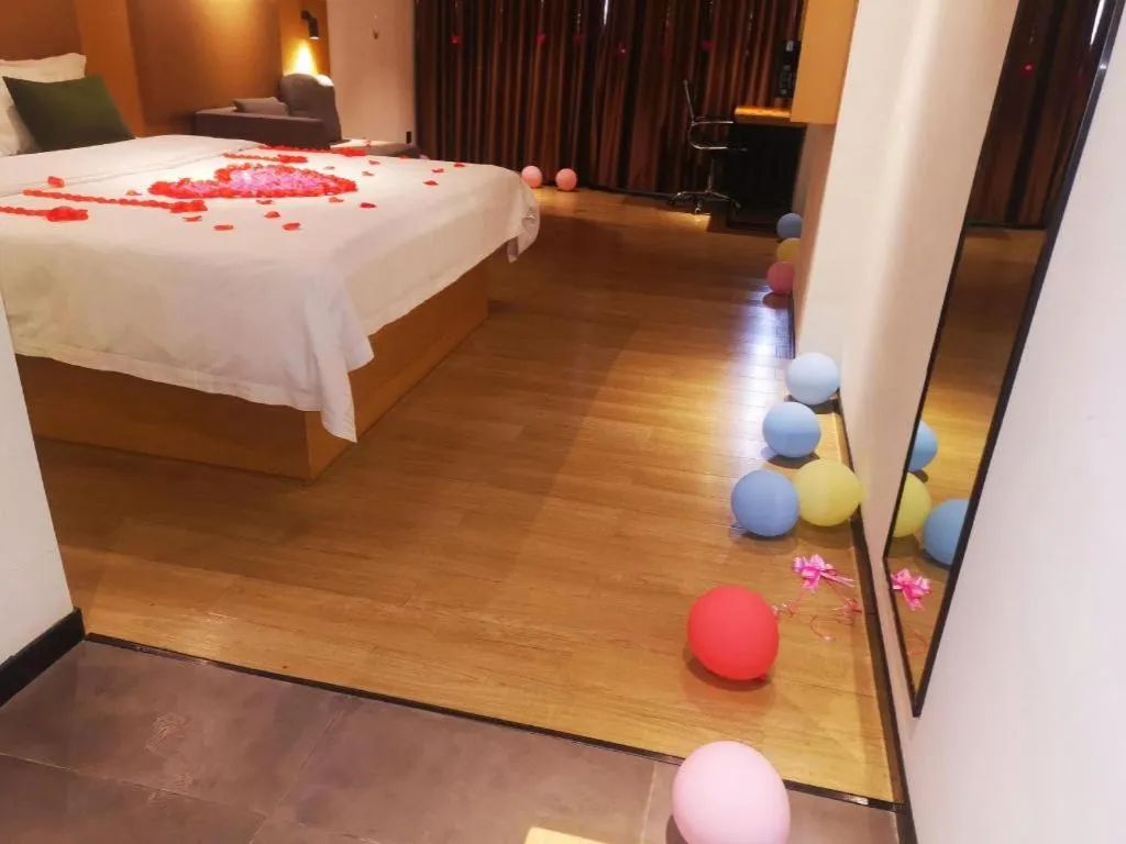 Bed in Green Tree Inn Guangxi Wuzhou 2nd Xinxing Road Liangguang Market