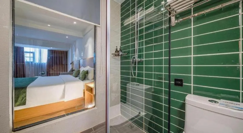 Bed in Green Tree Inn Guangxi Wuzhou 2nd Xinxing Road Liangguang Market