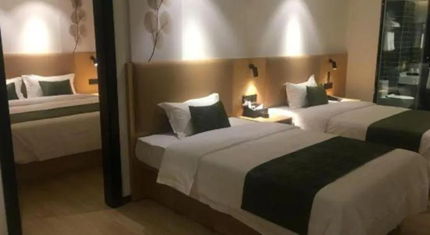 Bed in Green Tree Inn Guangxi Wuzhou 2nd Xinxing Road Liangguang Market