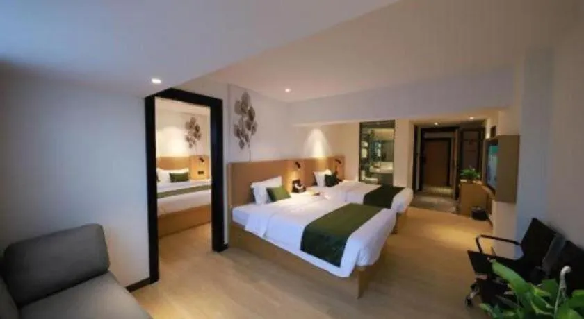Bed in Green Tree Inn Guangxi Wuzhou 2nd Xinxing Road Liangguang Market