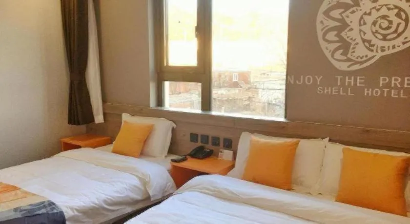 Bed in Shell Hotel Beijing Miyun District Shuiku Yangguang
