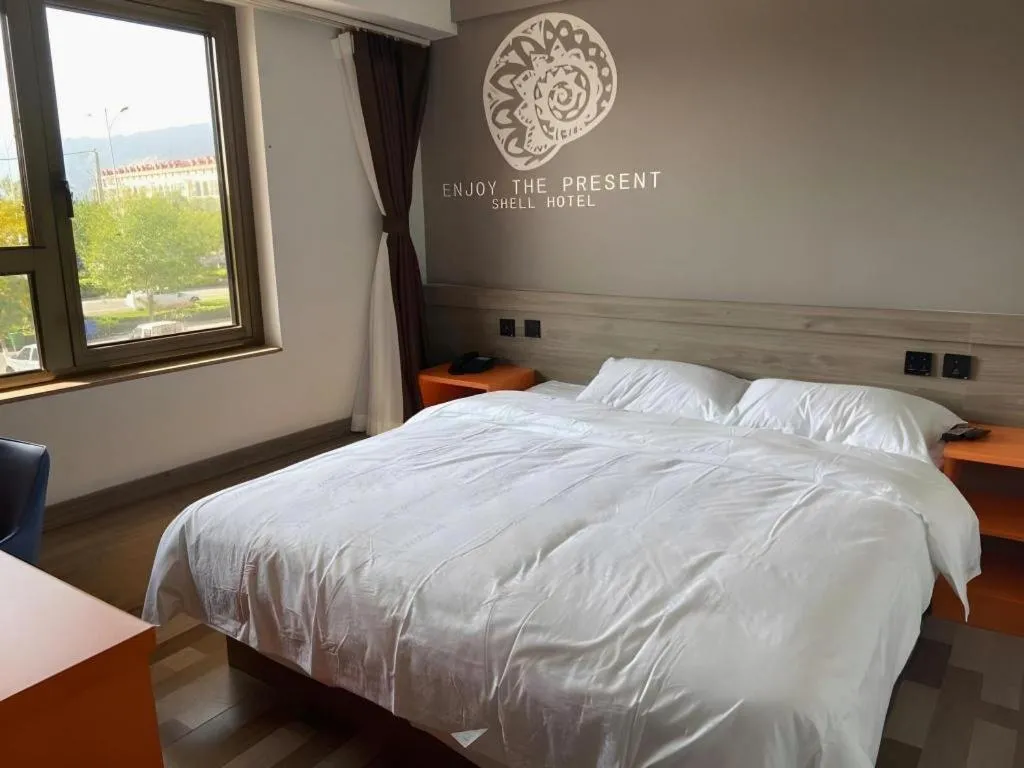 Bed in Shell Hotel Beijing Miyun District Shuiku Yangguang
