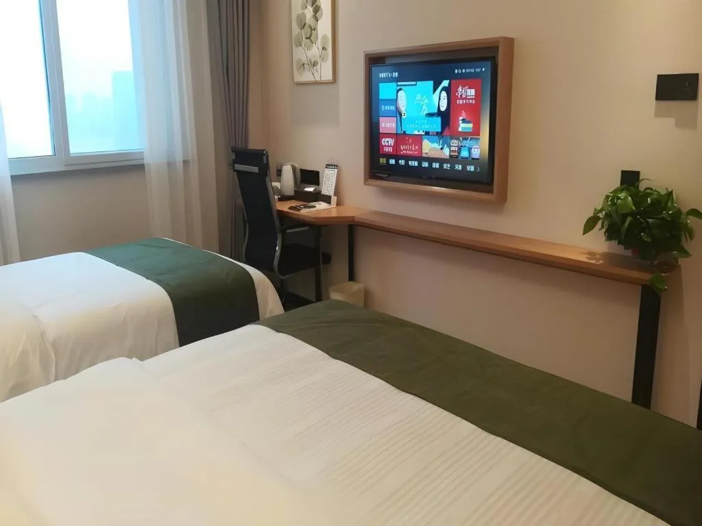 Bed in Green Tree Inn Fuyang Funan County Tianzhu Square