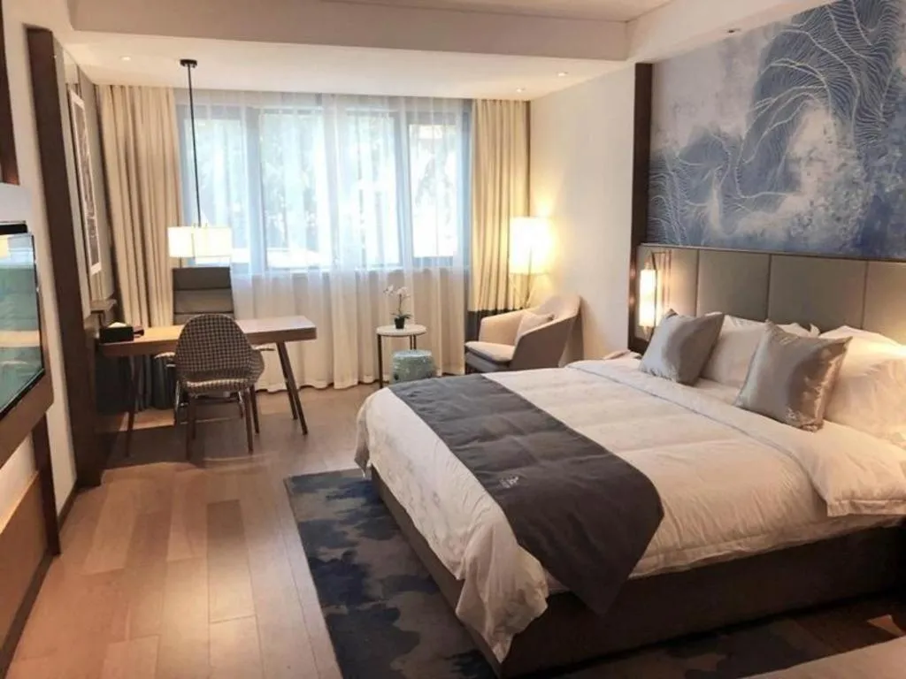 Bed in GreenTree Eastern Hotel Linyi Linshu County Aegean Sea