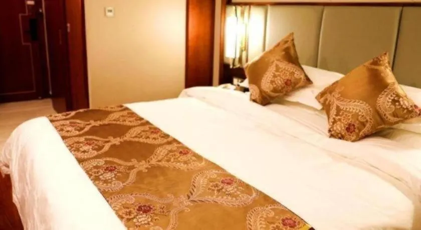 Bed in GreenTree Eastern Hotel Linyi Linshu County Aegean Sea