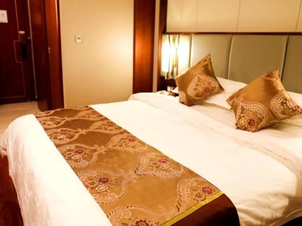 Bed in GreenTree Eastern Hotel Linyi Linshu County Aegean Sea