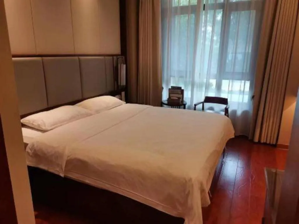 Bed in GreenTree Eastern Hotel Linyi Linshu County Aegean Sea