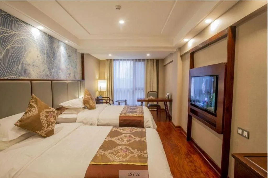 Bed in GreenTree Eastern Hotel Linyi Linshu County Aegean Sea