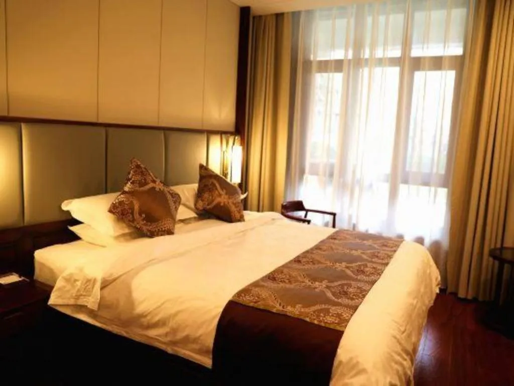 Bed in GreenTree Eastern Hotel Linyi Linshu County Aegean Sea