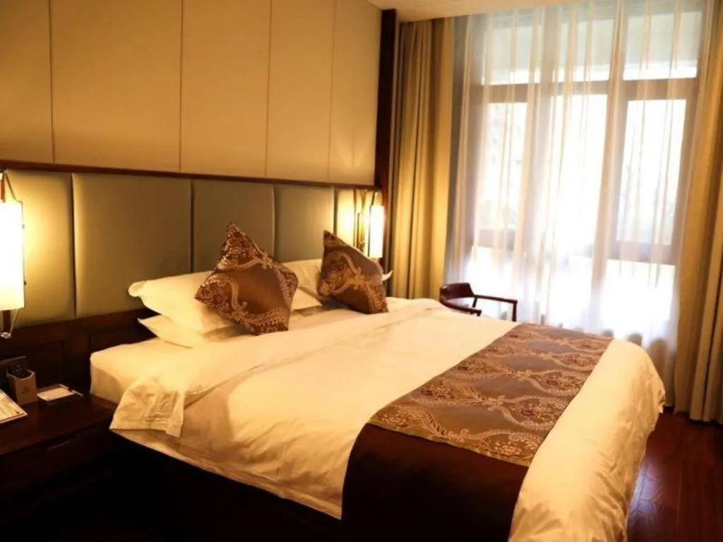 Bed in GreenTree Eastern Hotel Linyi Linshu County Aegean Sea