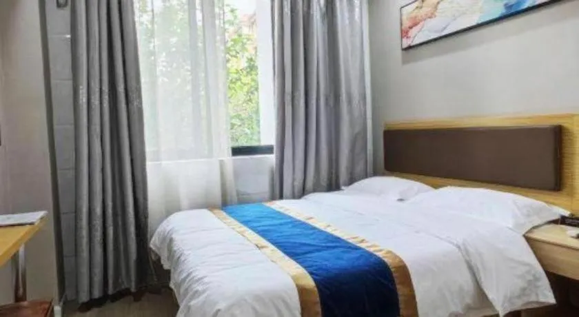 Bed in Shell Hotel Shanghai Normal University Hongcao Road Metro Station Guiping Road