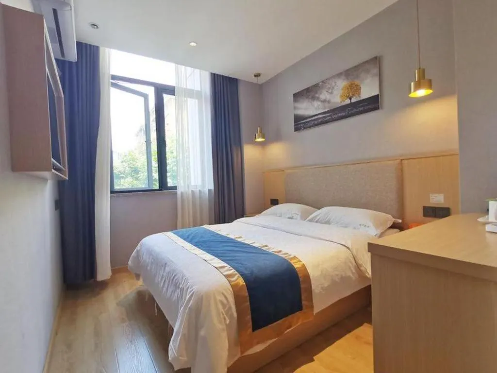 Bed in Shell Hotel Shanghai Normal University Hongcao Road Metro Station Guiping Road