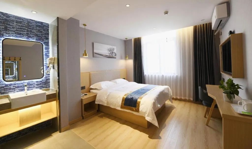Bed in Shell Hotel Shanghai Normal University Hongcao Road Metro Station Guiping Road