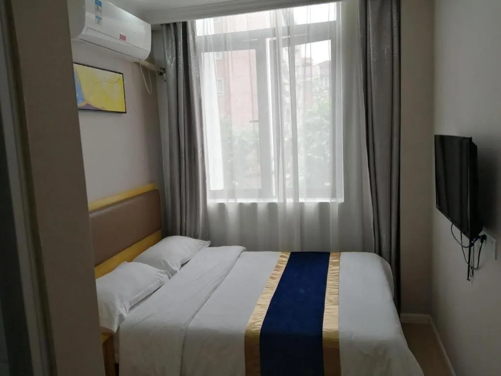 Bed in Shell Hotel Shanghai Normal University Hongcao Road Metro Station Guiping Road