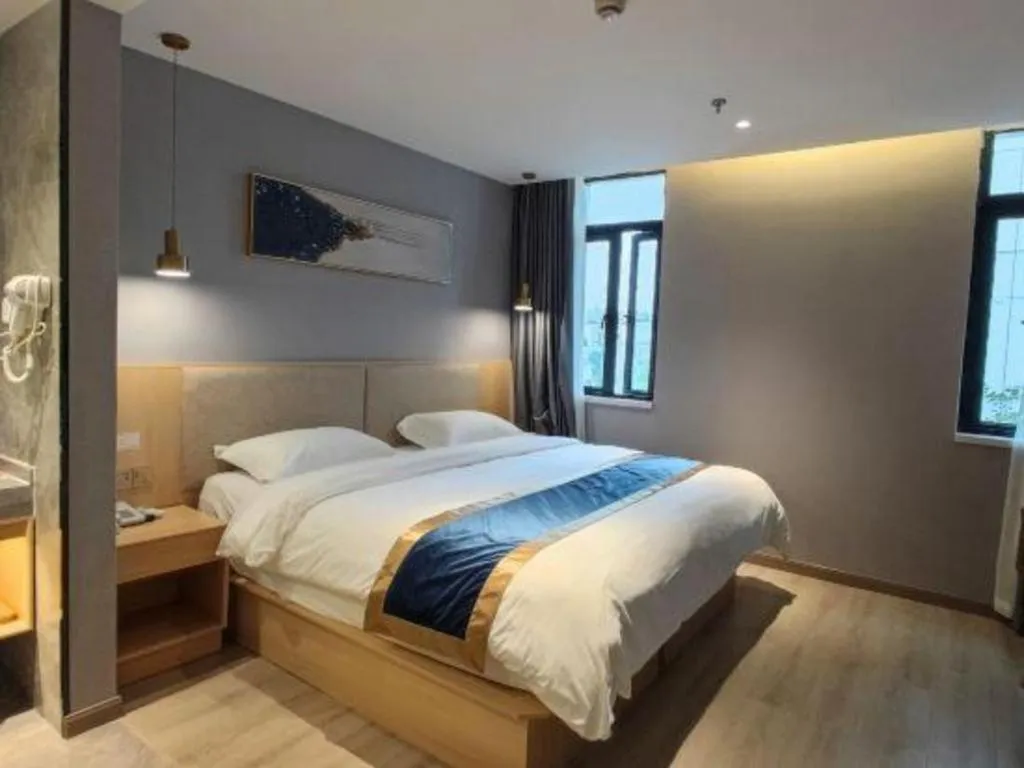 Bed in Shell Hotel Shanghai Normal University Hongcao Road Metro Station Guiping Road