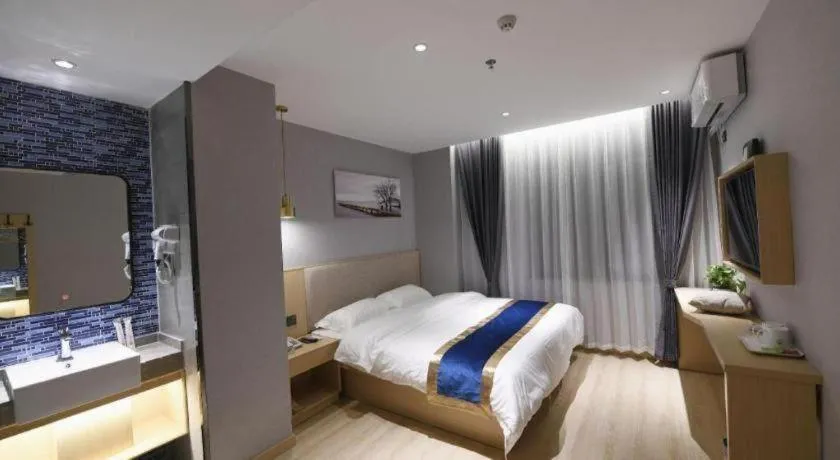 Bed in Shell Hotel Shanghai Normal University Hongcao Road Metro Station Guiping Road