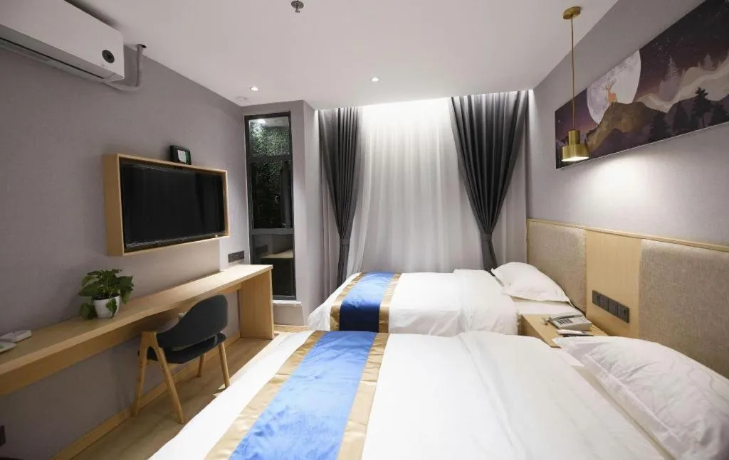 Bed in Shell Hotel Shanghai Normal University Hongcao Road Metro Station Guiping Road