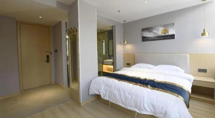 Bed in Shell Hotel Shanghai Normal University Hongcao Road Metro Station Guiping Road