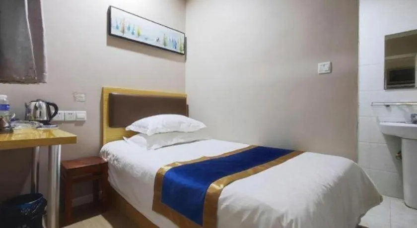 Bed in Shell Hotel Shanghai Normal University Hongcao Road Metro Station Guiping Road