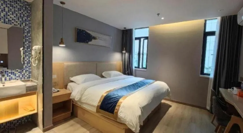 Bed in Shell Hotel Shanghai Normal University Hongcao Road Metro Station Guiping Road