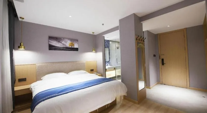 Bed in Shell Hotel Shanghai Normal University Hongcao Road Metro Station Guiping Road