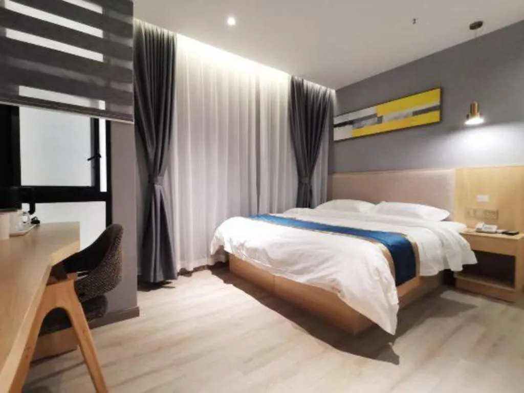 Bed in Shell Hotel Shanghai Normal University Hongcao Road Metro Station Guiping Road