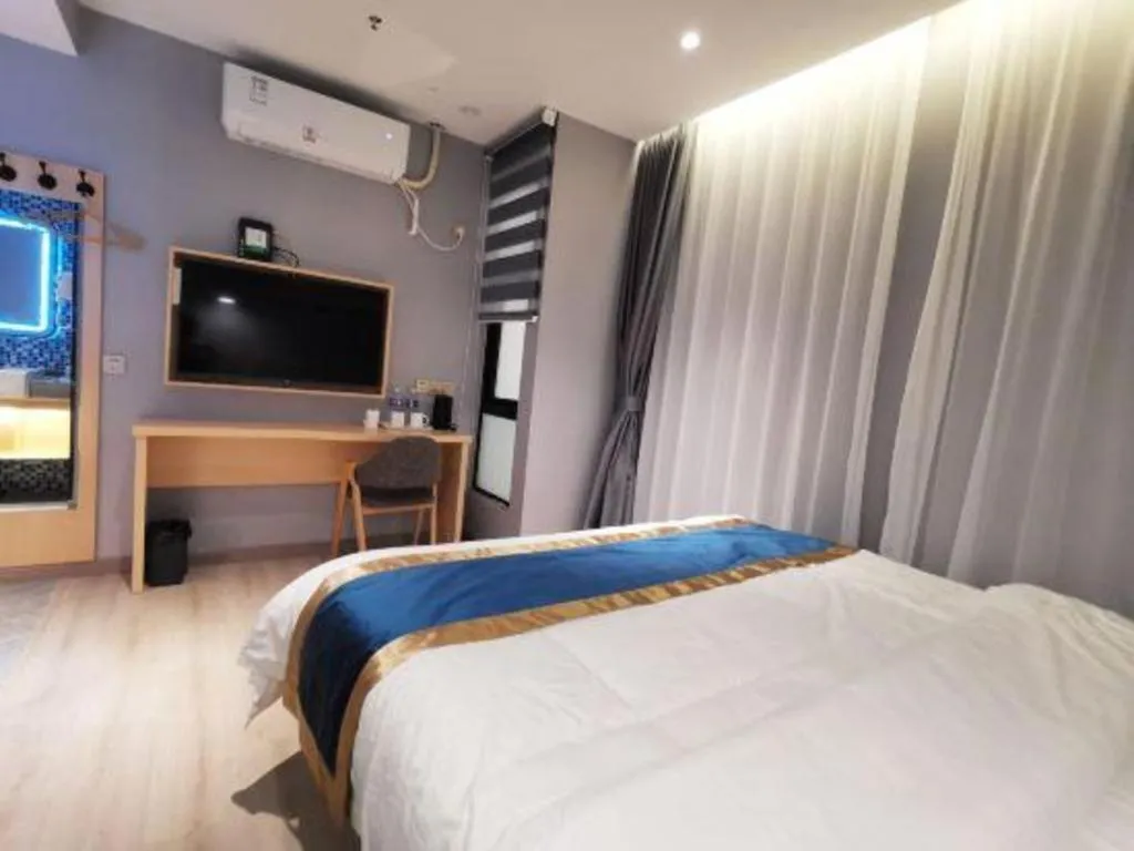 Bed in Shell Hotel Shanghai Normal University Hongcao Road Metro Station Guiping Road