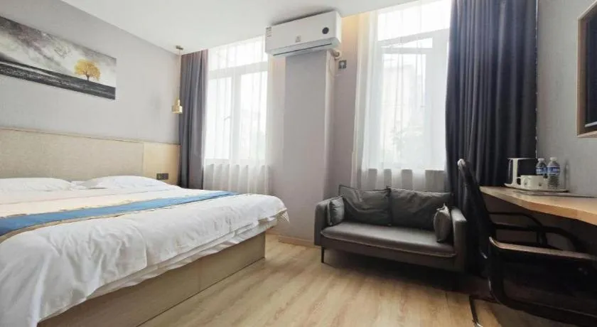 Bed in Shell Hotel Shanghai Normal University Hongcao Road Metro Station Guiping Road