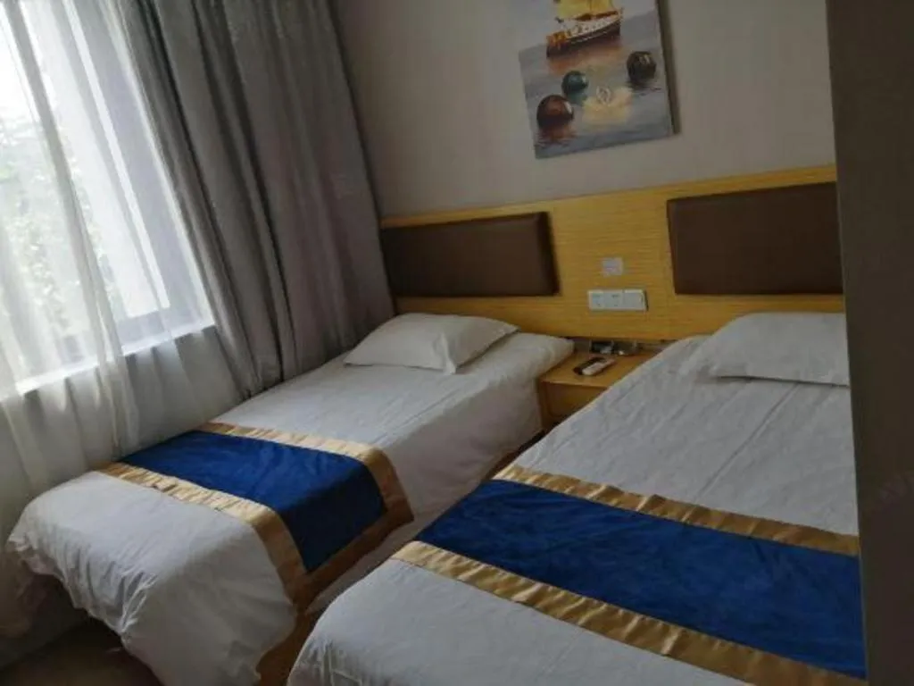 Bed in Shell Hotel Shanghai Normal University Hongcao Road Metro Station Guiping Road