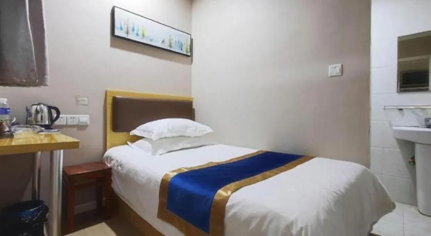 Bed in Shell Hotel Shanghai Normal University Hongcao Road Metro Station Guiping Road