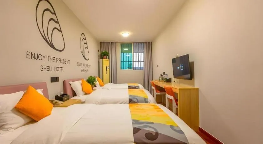 Bed in Shell Hotel Suzhou Zhangjiagang Jingang Town Central Plaza